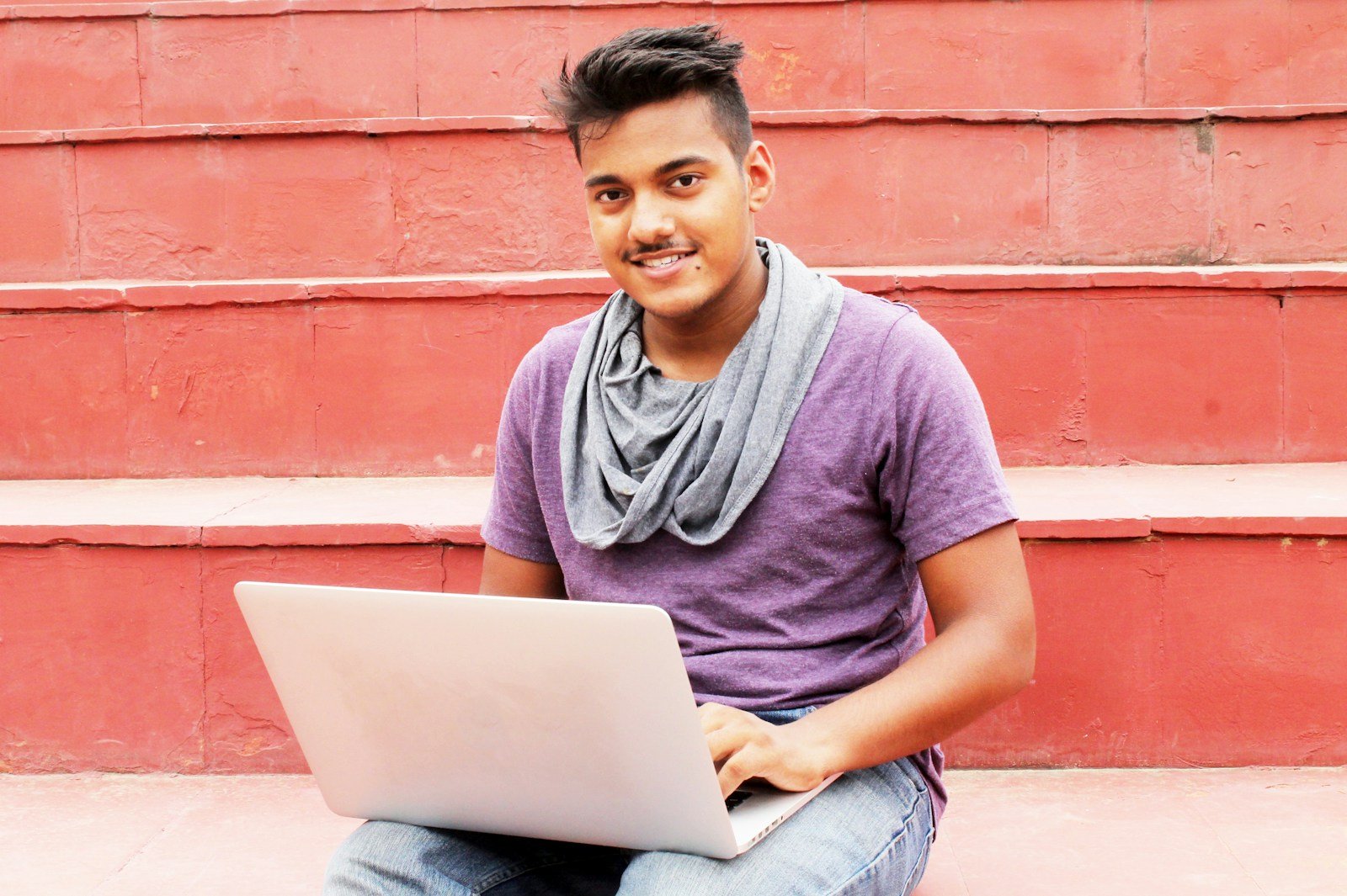 Indian student with laptop